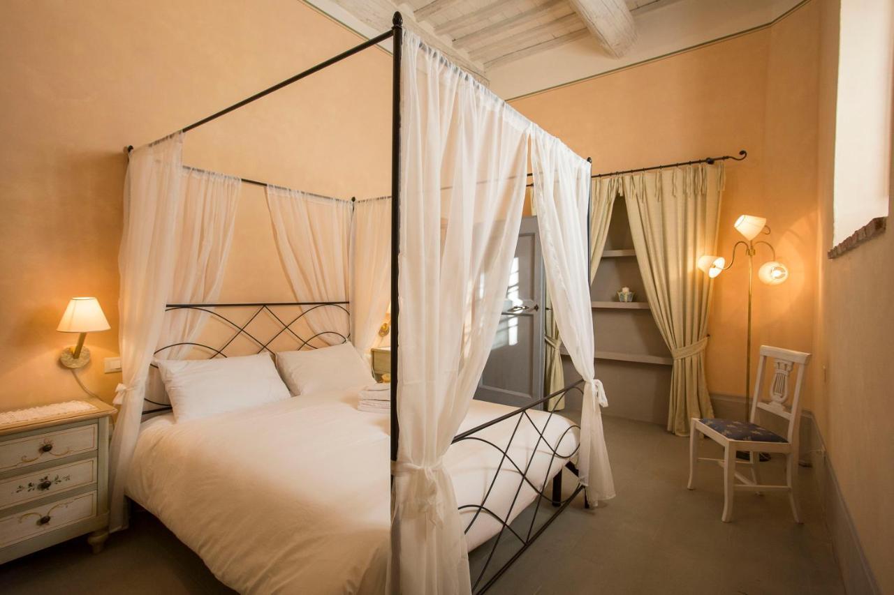 Podere San Pietro Resort กาสติลิออน ฟิบอคคี ภายนอก รูปภาพ